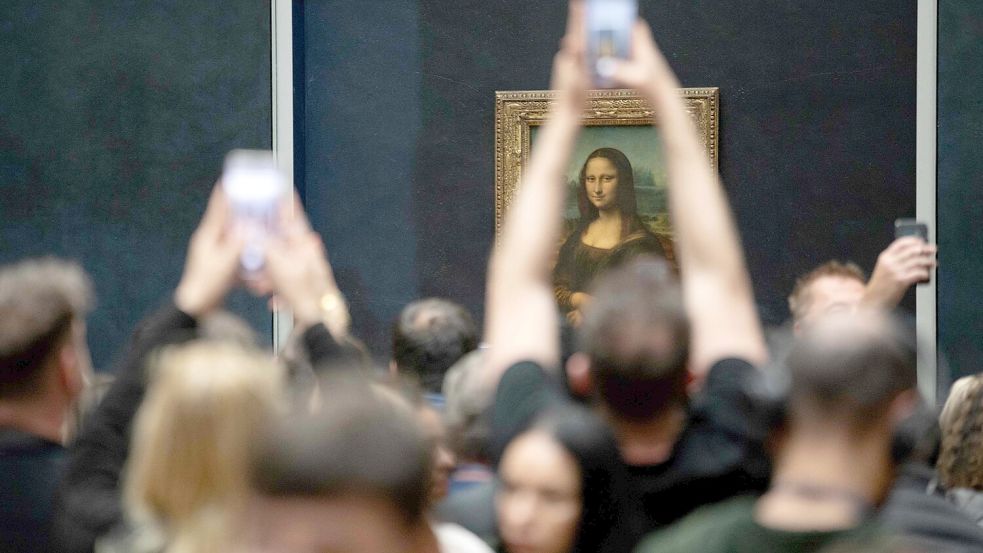 Leonardo Da Vincis „Mona Lisa“ zieht täglich tausende Besucher in den Louvre. Foto: AFP