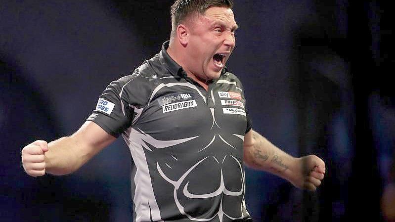 Der amtierende Weltmeister: Gerwyn Price aus Wales jubelt. Foto: Bradley Collyer/PA Wire/dpa