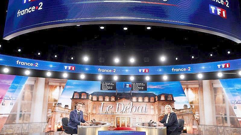 Emmanuel Macron und Marine Le Pen vor der TV-Debatte. Foto: Ludovic Marin/Pool AFP/AP/dpa