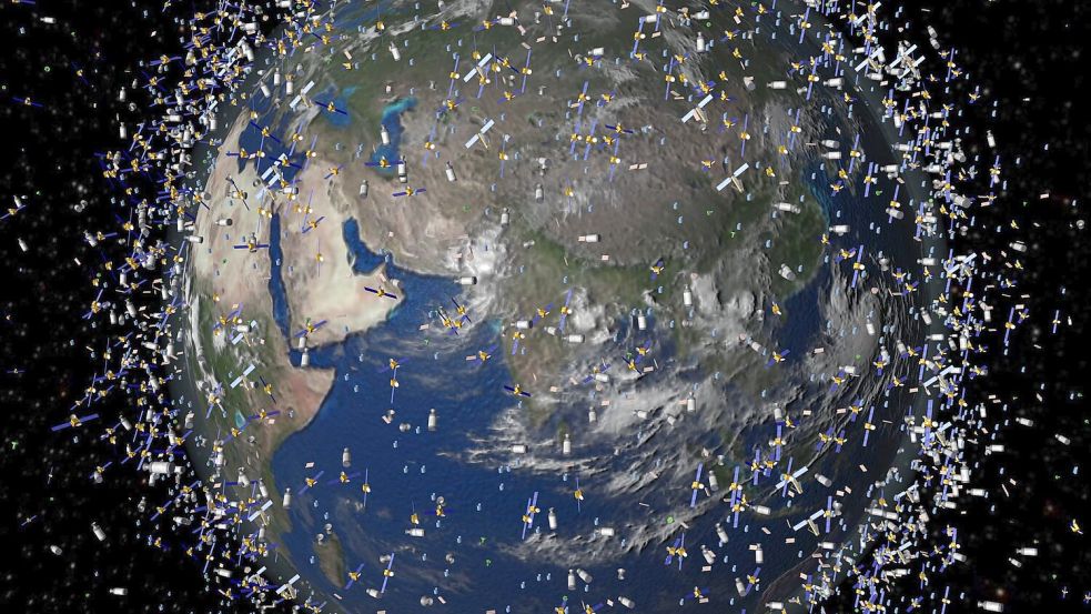 Tausende Satelliten und noch mehr Trümmerteile umfliegen die Erde - auch wenn sie eigentlich kleiner sind als auf diesem Bild. Foto: ESA/ESA/dpa