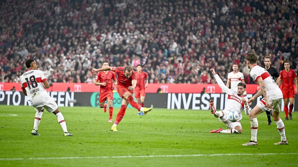 Harry Kane (M) schießt Bayern München zum Sieg. Foto: Tom Weller/dpa