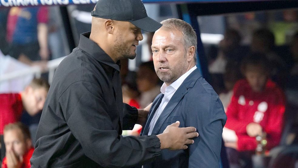 Verlierer Vincent Kompany (l) und Triumphator Hansi Flick (r). Foto: Sven Hoppe/dpa