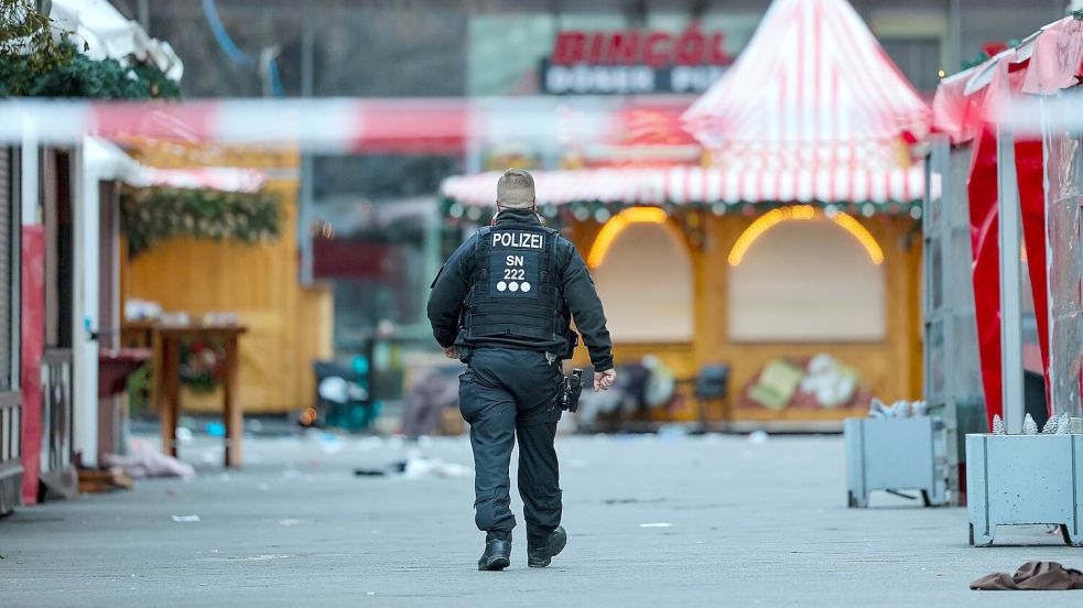 Entsetzen nach der Todesfahrt: Während in Magdeburg noch nicht mal die Opfer gezählt sind, pöbelt Elon Musk auf Twitter rum. Foto: Jan Woitas/dpa