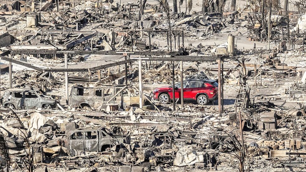 Ganze Straßenzüge wurden verwüstet. Foto: Noah Berger/AP/dpa